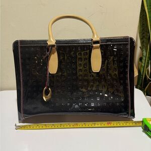 Arcadia Black Patent
Leather Crossbody Straps and goldtone tag Black Tote